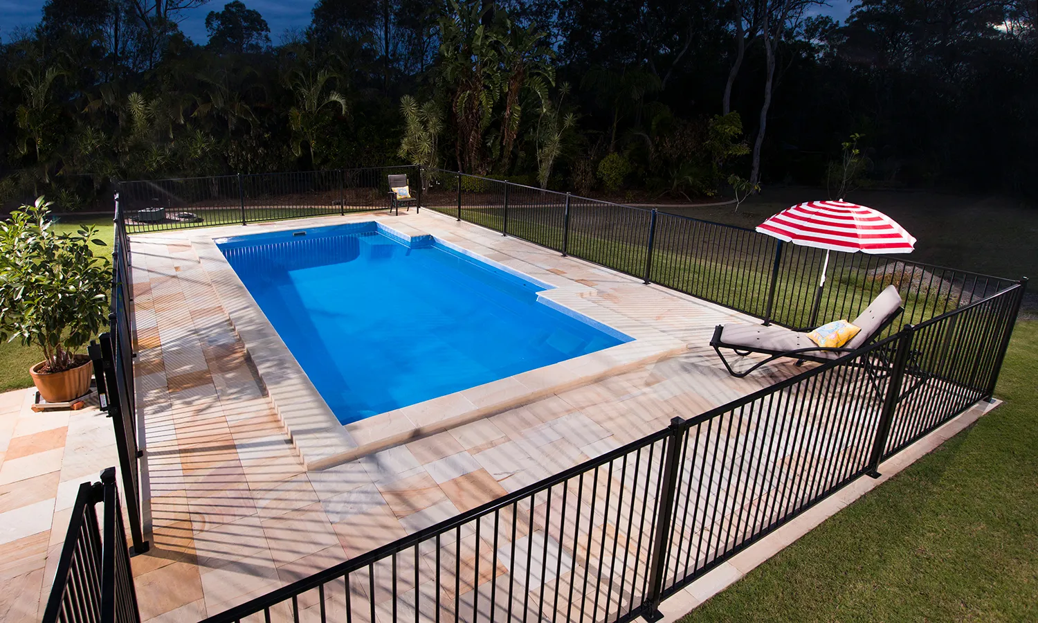 Freedom Vice President fibreglass pool with fencing