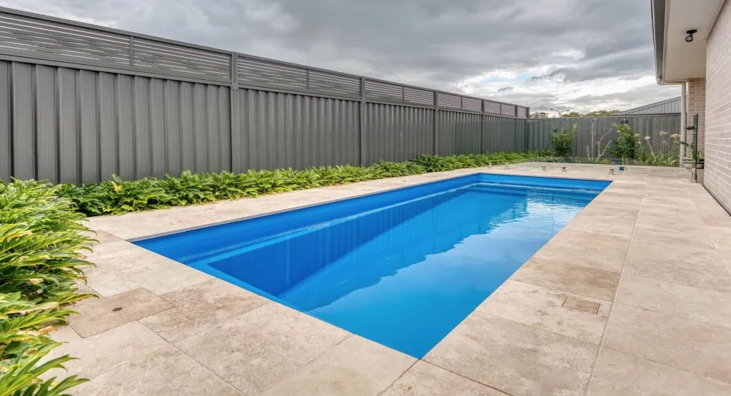 Masterbuilt Davinci pool with paved surround by Aquatime Pools
